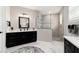 Bathroom featuring a sink vanity and walk-in shower with stone flooring at 10082 Sw 82Nd Place Rd, Ocala, FL 34481