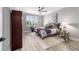 A stylish secondary bedroom with decor, wood-look flooring and great light at 10082 Sw 82Nd Place Rd, Ocala, FL 34481