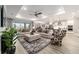 Open-concept living space featuring living room, dining area, and kitchen with modern decor and finishes at 10082 Sw 82Nd Place Rd, Ocala, FL 34481