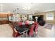 Open layout showcasing the kitchen, dining, and living areas creating a perfect space for gatherings at 10327 Sw 96Th Loop, Ocala, FL 34481