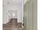 Bright entryway showcasing hardwood floors and an open layout, leading into the inviting living spaces at 10347 Sw 99Th Ln, Ocala, FL 34481