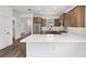 Modern kitchen featuring stainless steel appliances, ample counter space, and stylish wood cabinets at 10347 Sw 99Th Ln, Ocala, FL 34481