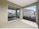 Screened lanai with slider access to the backyard, offers privacy and views at 10347 Sw 99Th Ln, Ocala, FL 34481