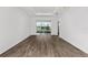 Spacious living area featuring sliding glass doors that lead to the outdoors at 10347 Sw 99Th Ln, Ocala, FL 34481