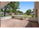 Outdoor patio featuring brick pavers and a gated entrance in a residential neighborhood at 11146 Sw 68Th Ct, Ocala, FL 34476