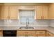 The kitchen features granite countertops, white subway tile backsplash, and light wood cabinets at 11146 Sw 68Th Ct, Ocala, FL 34476