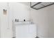 Functional laundry room featuring a washing machine and dryer at 11146 Sw 68Th Ct, Ocala, FL 34476
