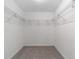 A walk-in closet with ample shelving is an ideal solution for convenient storage at 12720 Sw 73Rd Street, Ocala, FL 34481