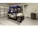 Garage featuring a golf cart at 15691 Sw 11Th Court Rd, Ocala, FL 34473