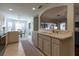 Bright kitchen with white countertops, a breakfast bar, and stainless steel appliances at 15691 Sw 11Th Court Rd, Ocala, FL 34473