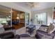 Covered Lanai with wicker furniture at 15691 Sw 11Th Court Rd, Ocala, FL 34473
