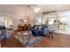 Open-concept layout with hardwood flooring, connecting the living room, dining area, and kitchen at 15691 Sw 11Th Court Rd, Ocala, FL 34473