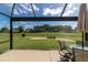 Outdoor patio with covered awning overlooking the green space at 15691 Sw 11Th Court Rd, Ocala, FL 34473