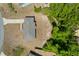 Overhead aerial view of the house showing the roof and the surrounding wooded area at 17147 Sw 42Nd Ct, Ocala, FL 34473