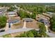 Aerial view of a single-story home with a large yard nestled among lush greenery at 17147 Sw 42Nd Ct, Ocala, FL 34473