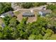 Aerial view of a home with lush greenery shows its location in a peaceful, verdant setting at 17147 Sw 42Nd Ct, Ocala, FL 34473