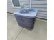 Carrier air conditioner installed outside of home on concrete slab next to window at 3154 Merrit Ln, The Villages, FL 32163