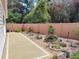 Backyard featuring a mix of garden plants and decorative gravel at 3154 Merrit Ln, The Villages, FL 32163