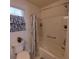 Bathroom features a shower-tub combo with stylish decorative shower curtain at 3154 Merrit Ln, The Villages, FL 32163