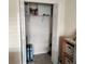 Neat closet with shelving and hanging space, providing ample storage solutions at 3154 Merrit Ln, The Villages, FL 32163