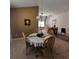 The dining area opens to the living room and kitchen, great for entertaining at 3154 Merrit Ln, The Villages, FL 32163
