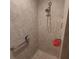 Shower features tile surround, seat and updated fixtures at 3154 Merrit Ln, The Villages, FL 32163