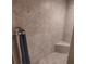 Shower features tile surround, seat and updated fixtures at 3154 Merrit Ln, The Villages, FL 32163