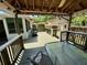 Spacious backyard deck with a table and chairs, overlooking a well-maintained yard at 4145 Se 3Rd St, Ocala, FL 34471