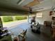Spacious garage with an open door, offering ample space for parking and additional storage at 4145 Se 3Rd St, Ocala, FL 34471