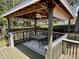 Charming gazebo with a table and chairs, perfect for outdoor dining and relaxation at 4145 Se 3Rd St, Ocala, FL 34471