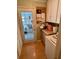 Functional laundry room with ample storage space, a washing machine, and a dryer at 4145 Se 3Rd St, Ocala, FL 34471