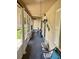 Cozy screened-in porch perfect for relaxing with outdoor furniture and natural light at 4145 Se 3Rd St, Ocala, FL 34471