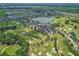 Expansive aerial view showcasing the golf course, community amenities, and surrounding residential areas at 4379 Nw 56Th Ct, Ocala, FL 34482