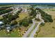 Aerial view of the community entrance featuring landscaping and manicured grounds at 4379 Nw 56Th Ct, Ocala, FL 34482
