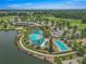 Aerial shot of the luxurious pool area, showcasing the lagoon-style pool and lap pool at 4379 Nw 56Th Ct, Ocala, FL 34482