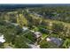 Aerial shot highlighting the property's pool and manicured lawn at 4530 Nw 78Th Ave, Ocala, FL 34482