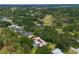 Overhead view showcasing the home with its pool and golf course vicinity at 4530 Nw 78Th Ave, Ocala, FL 34482