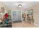 Light-filled foyer featuring decorative blue doors and tiled floors at 4530 Nw 78Th Ave, Ocala, FL 34482