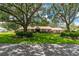 Traditional single-story home on a sprawling lot with shade trees at 4530 Nw 78Th Ave, Ocala, FL 34482