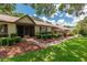 Welcoming front exterior showcasing well-maintained landscaping and charming curb appeal at 4530 Nw 78Th Ave, Ocala, FL 34482