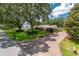 Charming single-story house with mature trees and a long driveway at 4530 Nw 78Th Ave, Ocala, FL 34482