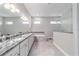 Bright bathroom with dual sinks, soaker tub, large shower, and granite countertops at 5489 Nantahala Ln, Lady Lake, FL 32159