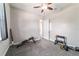 Spacious bedroom with ample space for home gym equipment and carpeted floors at 5489 Nantahala Ln, Lady Lake, FL 32159