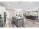 Kitchen showing an open concept to the rest of the house at 5489 Nantahala Ln, Lady Lake, FL 32159