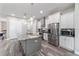 A well-equipped kitchen boasts stainless appliances, granite counters, and ample cabinet space at 5489 Nantahala Ln, Lady Lake, FL 32159