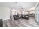 Spacious living room shows the open floorplan and direct access to the kitchen at 5489 Nantahala Ln, Lady Lake, FL 32159