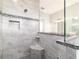 This bathroom features a large shower with granite accents at 5489 Nantahala Ln, Lady Lake, FL 32159