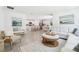 Spacious living area featuring an open layout and a harmonious blend of living spaces at 615 Marion Oaks Blvd, Ocala, FL 34473