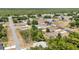The aerial view shows a quiet neighborhood with well-maintained single-Gathering homes at 6570 Sw 129Th Loop, Ocala, FL 34473