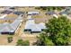An aerial view shows a lovely neighborhood with single-Gathering homes and mature trees at 6570 Sw 129Th Loop, Ocala, FL 34473